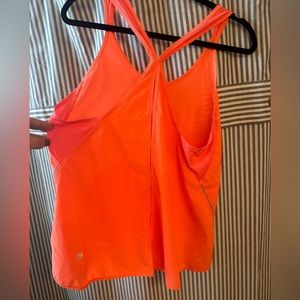 Lululemon size 10. Bright coral colored tank.